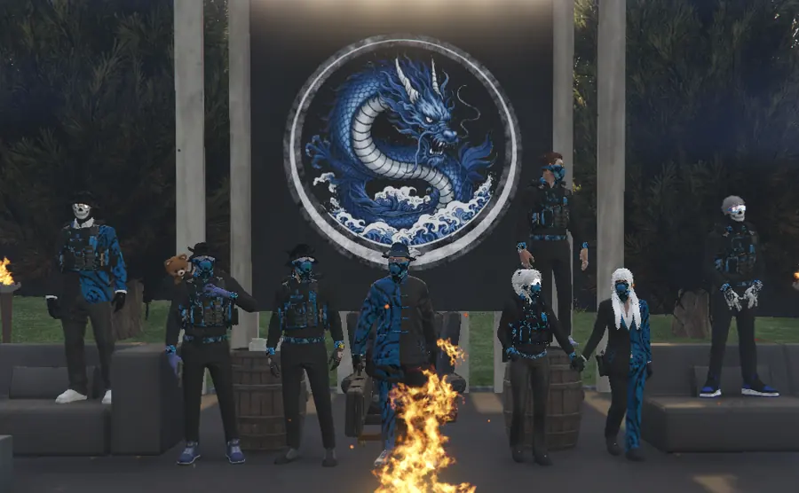 A crew in matching blue dragon outfits posing together