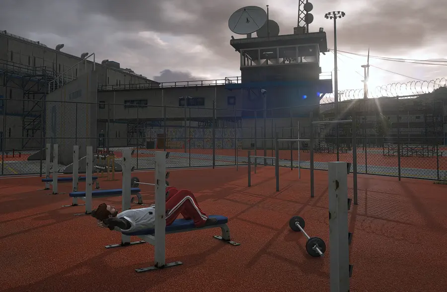 Lifting weights on the outdoor gym benches beneath the old watchtower